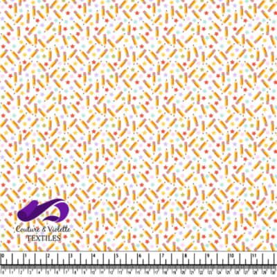 Colorful pencil and star pattern on white fabric background