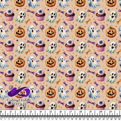 Ghosts jack o lanterns cupcakes and candies on beige background