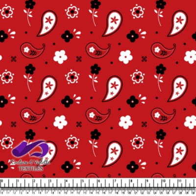 Red fabric pattern with white and black flowers and paisley shapes