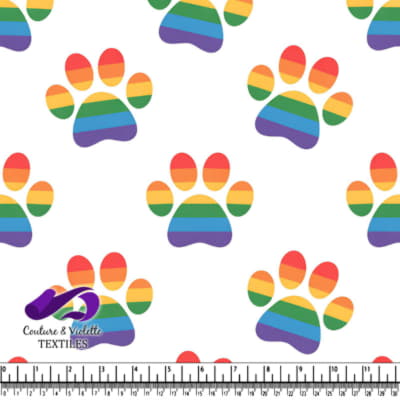 Pattern of rainbow colored paw prints