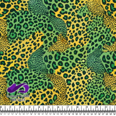 Colorful leopard print fabric pattern with green and yellow background and black spots