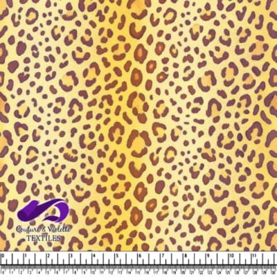 Yellow and brown leopard print textile fabric
