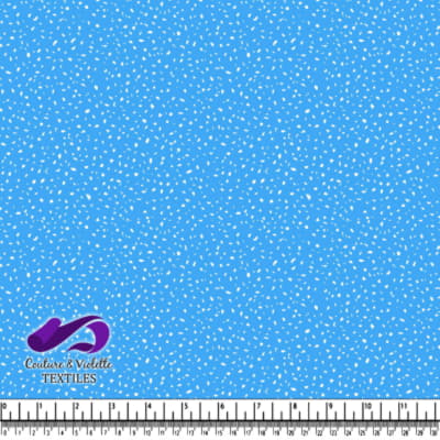 Blue fabric with scattered small white shapes