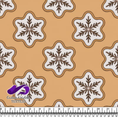 Snowflake decorated cookies on a beige background