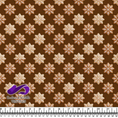 Snowflake shaped gingerbread cookies with white icing