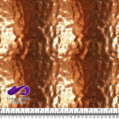 Textured metallic copper fabric with a wavy hammered pattern
