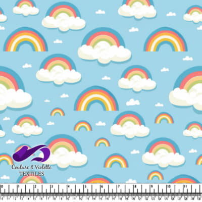 Colorful rainbows with white fluffy clouds on a light blue background