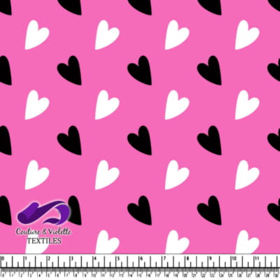 Black and White Hearts Pattern on Pink Background Textile Design