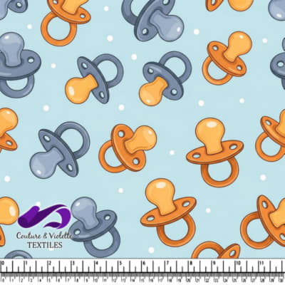 Pattern of Baby Pacifiers on Blue Background
