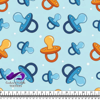 Baby Pacifiers Pattern on Blue Background